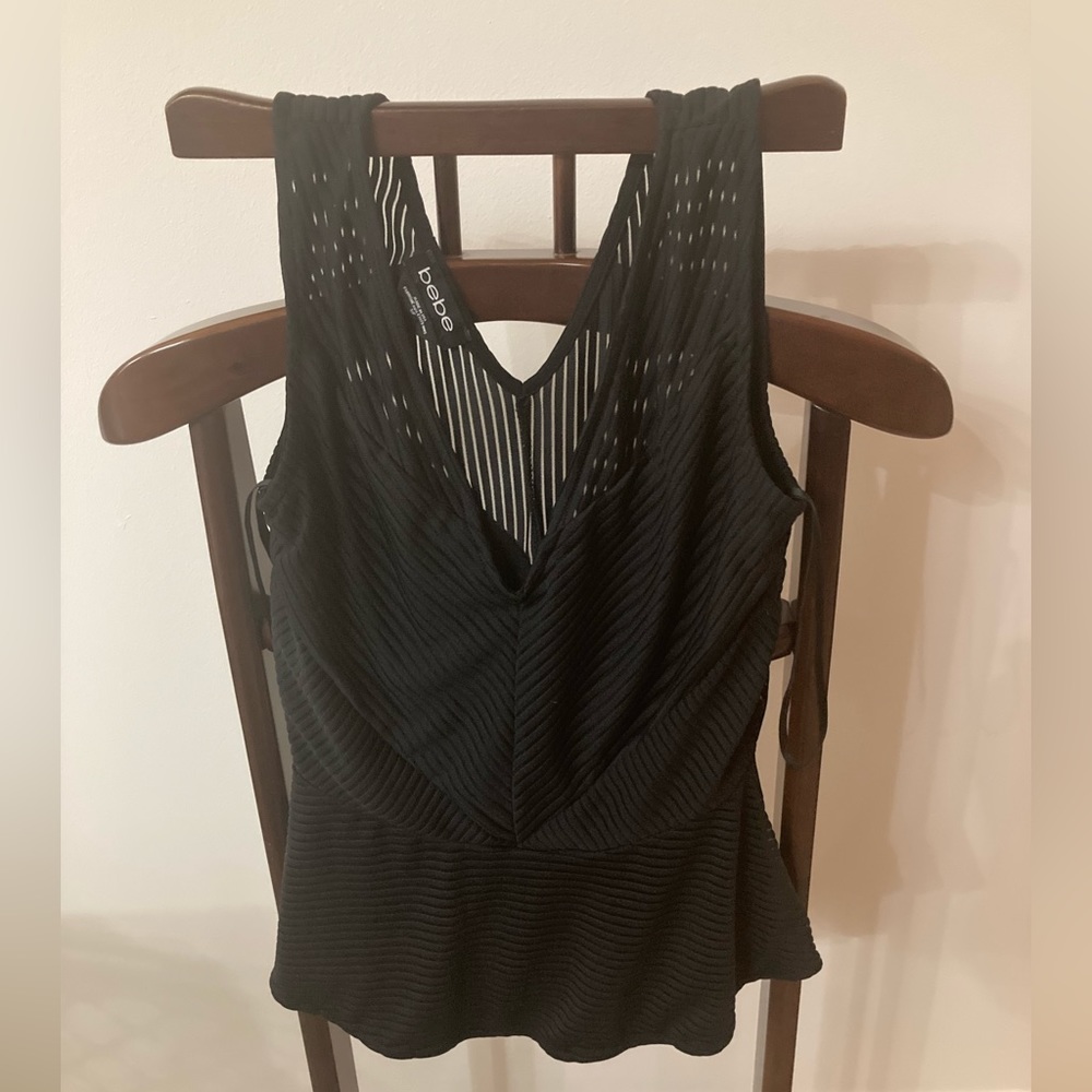 Bebe peplum tops size small
